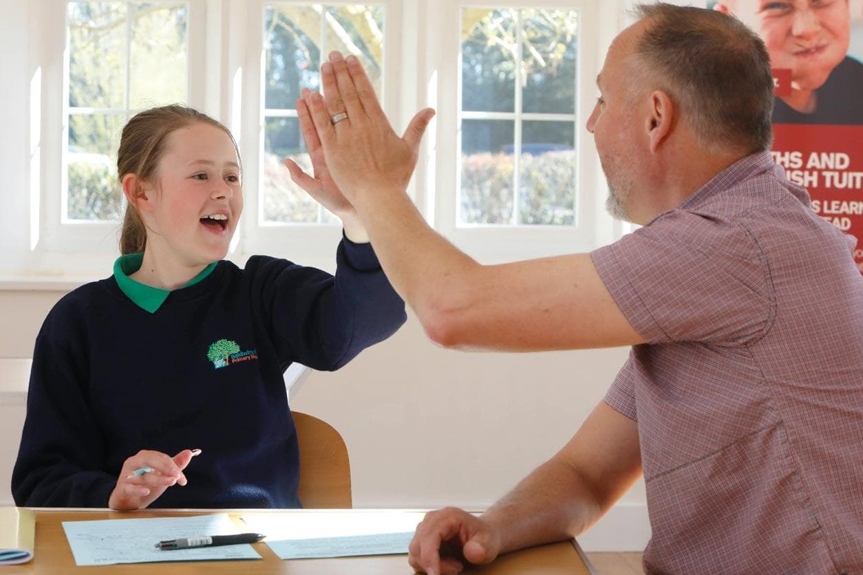 girl high five after assessment